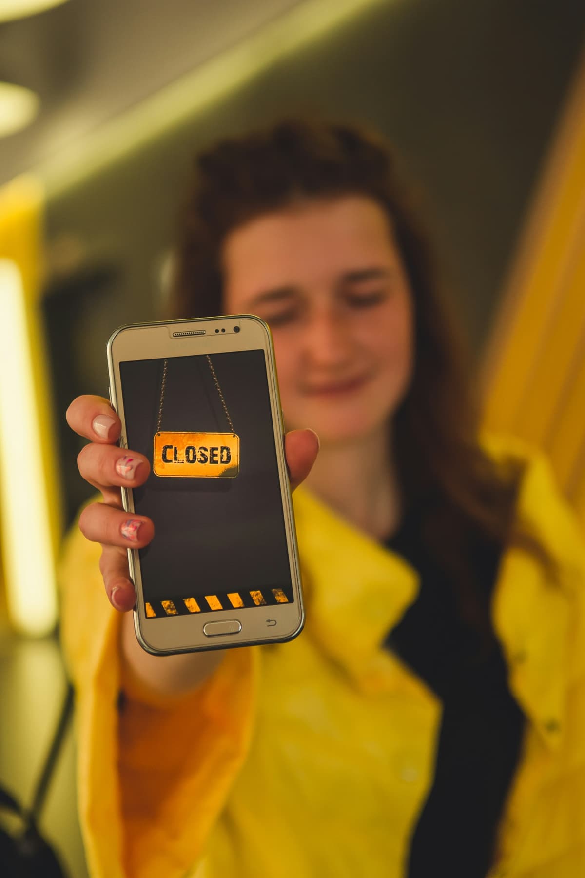 Phone showing Closed sign — Mint alternatives after the 2024 shutdown
