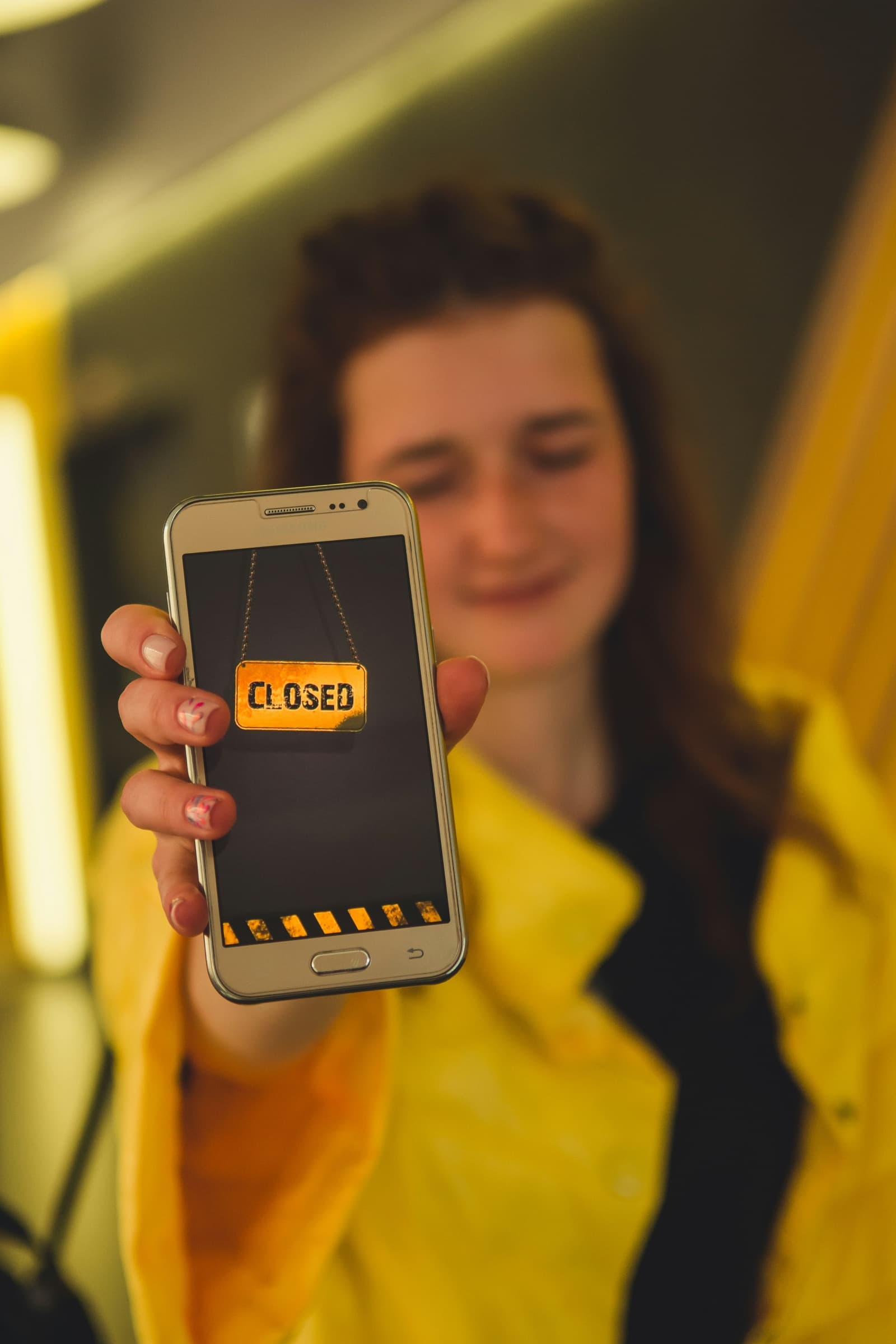 Phone showing Closed sign — Mint alternatives after the 2024 shutdown